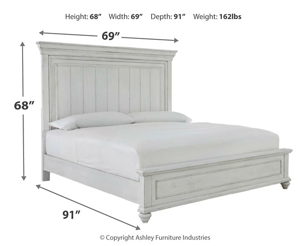 Kanwyn Queen Panel Bed with Mirrored Dresser and Chest